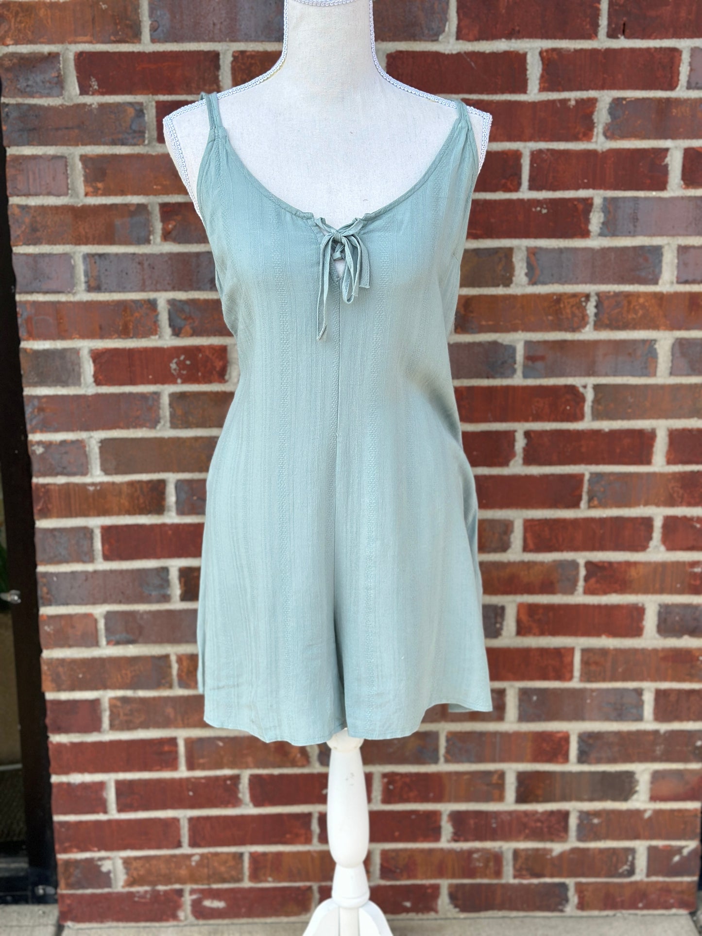Sage Lace Up Mini Ruffle Cami Romper