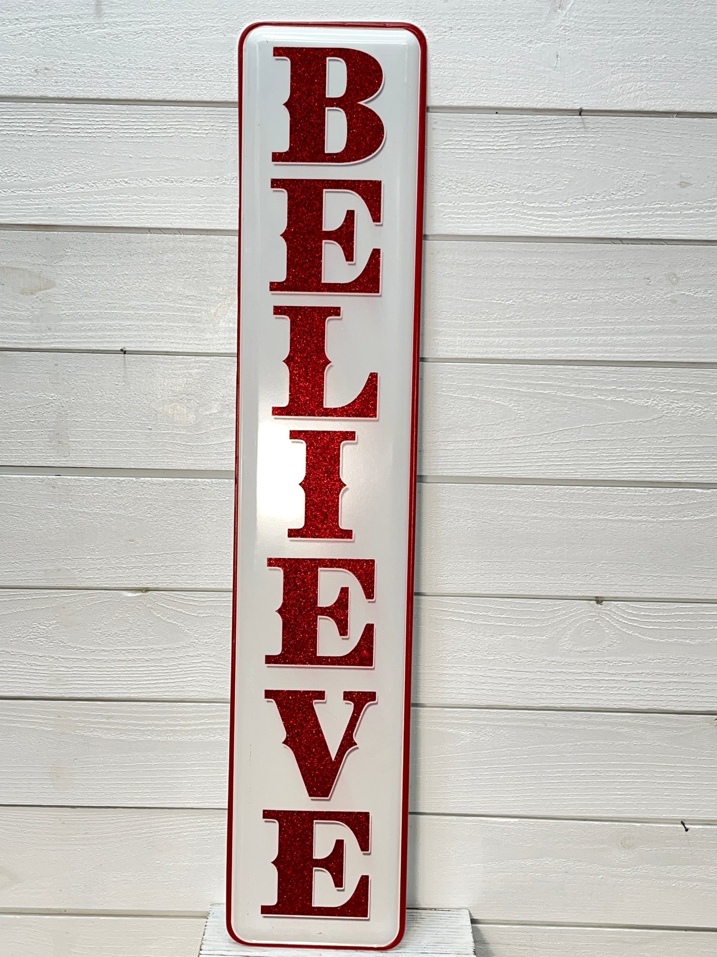 Vertical White Metal Red Glitter Believe Sign