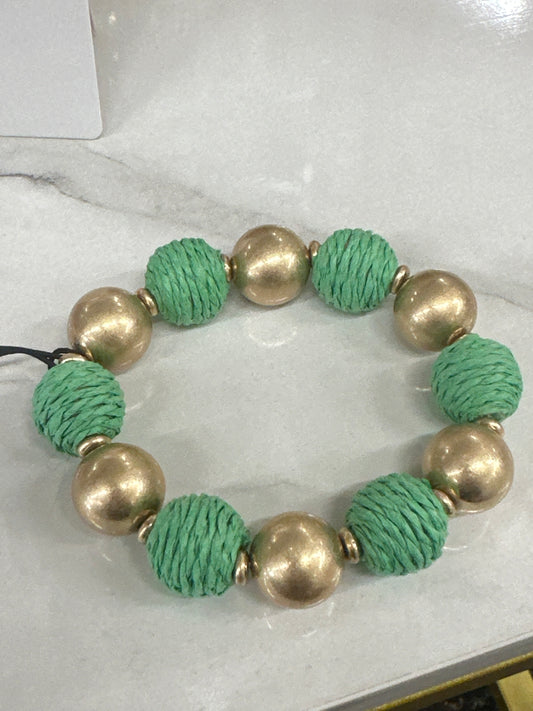 Canvas Style Demi Green Raffia And Gold Ball Bead Bracelet