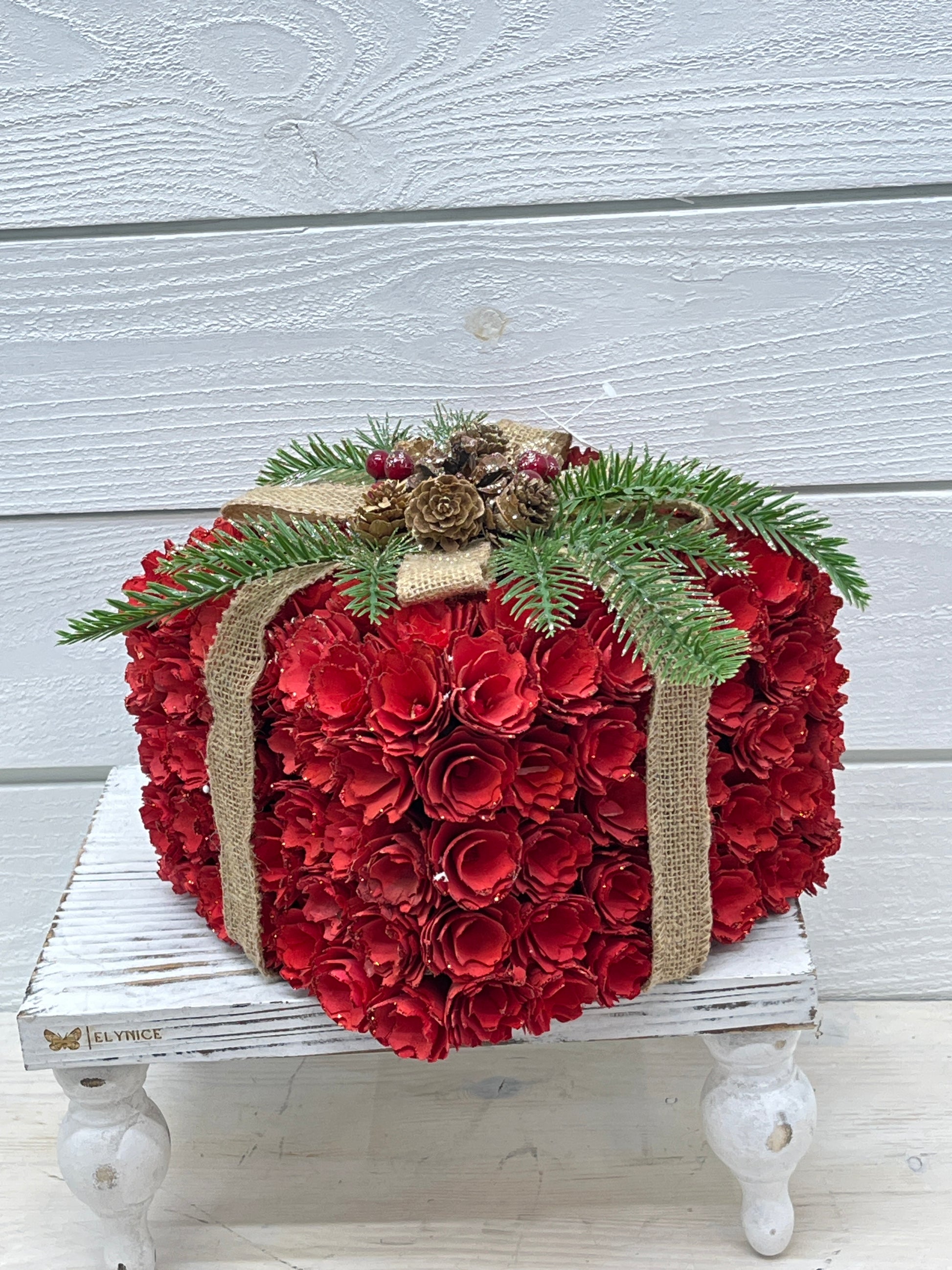 Red/Flower Gift With Burlap And Pine
