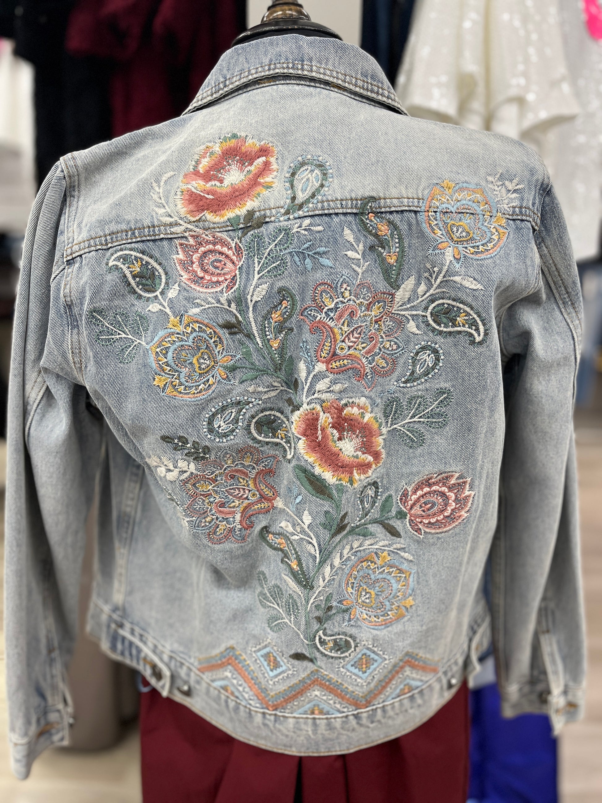 Light Denim Jacket With Floral Stitching On Back