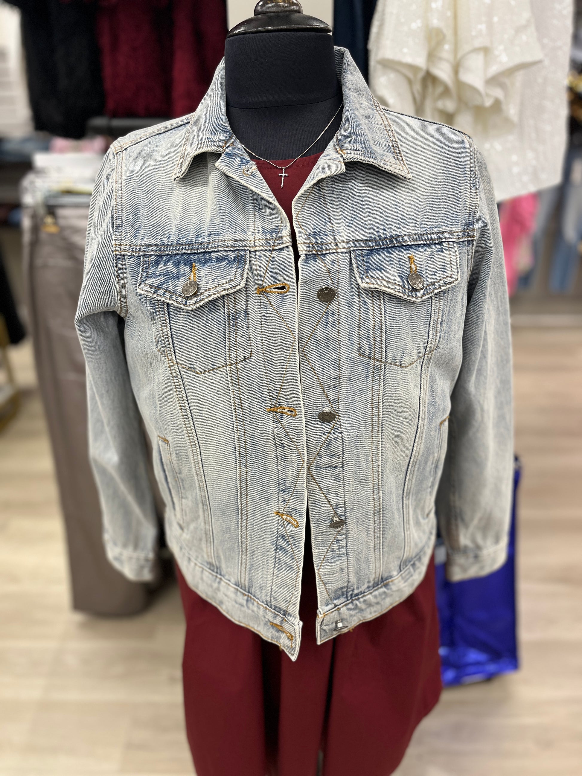 Light Denim Jacket With Floral Stitching On Back