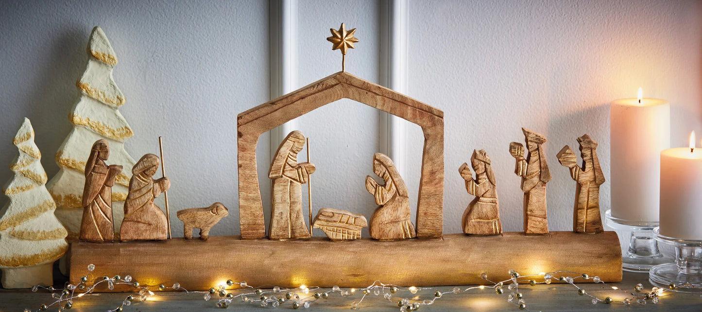 Nativity Scene On Carved Wood Log