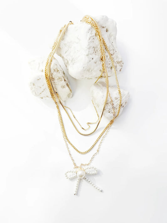 Southern Grace 4-Strand Necklace with Bow Pendant
