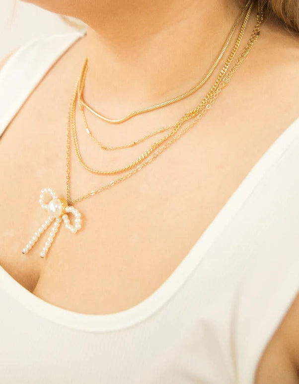 Southern Grace 4-Strand Necklace with Bow Pendant