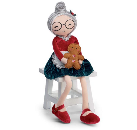 Mrs. Claus Holding Gingerbread