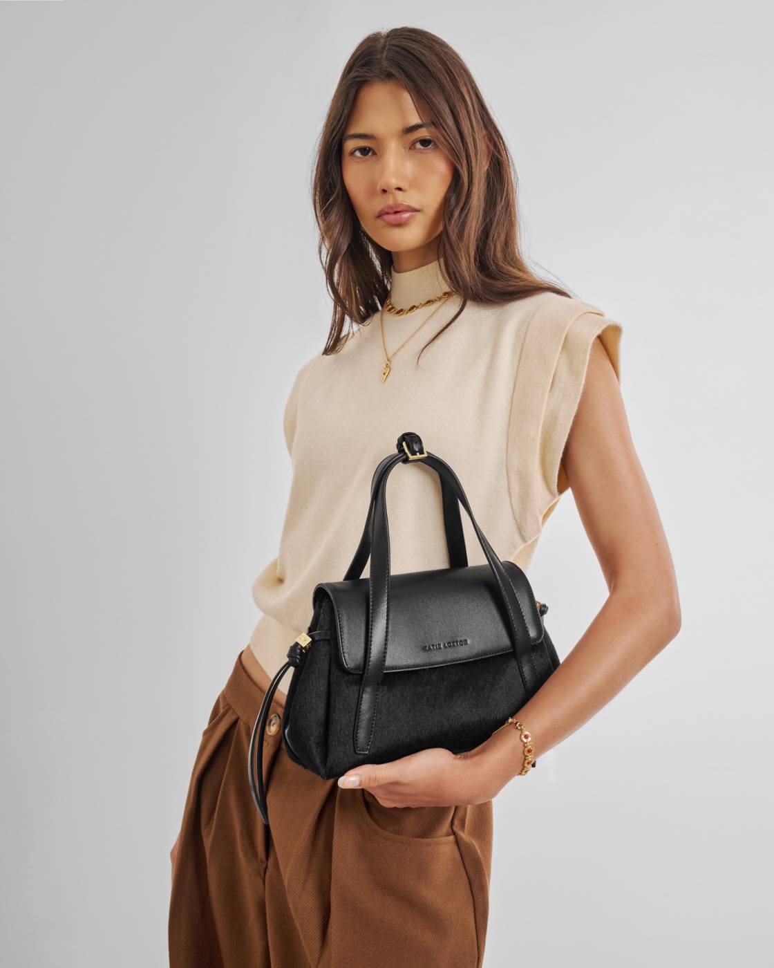 Katie Loxton Alyssa Black Faux Pony Top Handle Bag