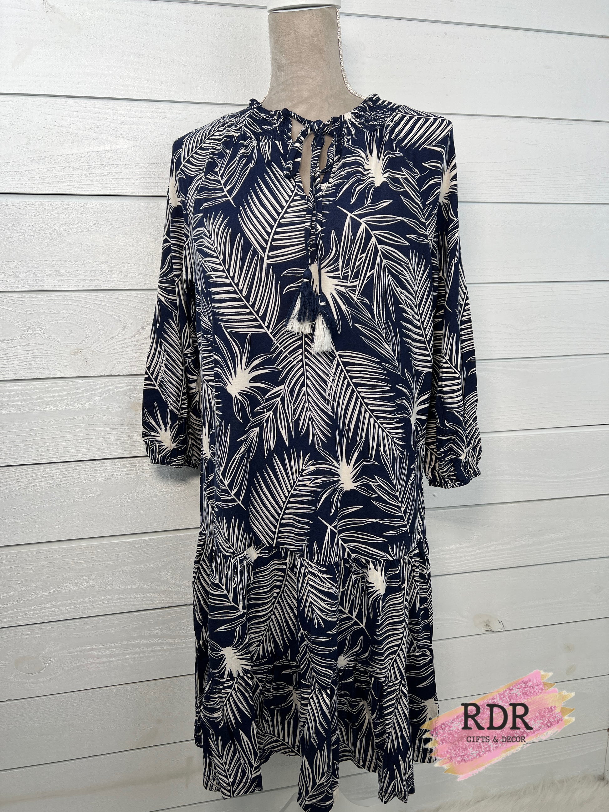 Smocked Swing Dress With Leaf Print And Tie Detail Rachelle Danielle Rose Gifts & Decor Smocked Swing Dress With Leaf Print And Tie Detail Rachelle Danielle Rose Gifts & Decor